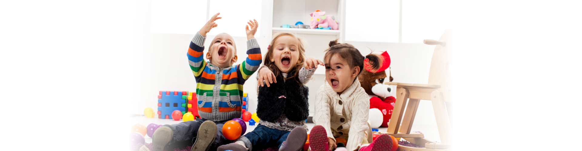 children smiling and playing